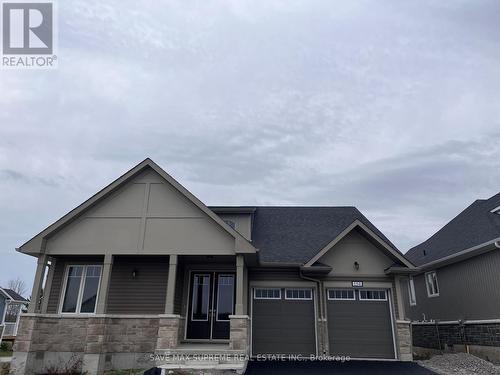 154 Country Club Drive, Loyalist, ON - Outdoor With Facade