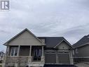 154 Country Club Drive, Loyalist, ON  - Outdoor With Facade 