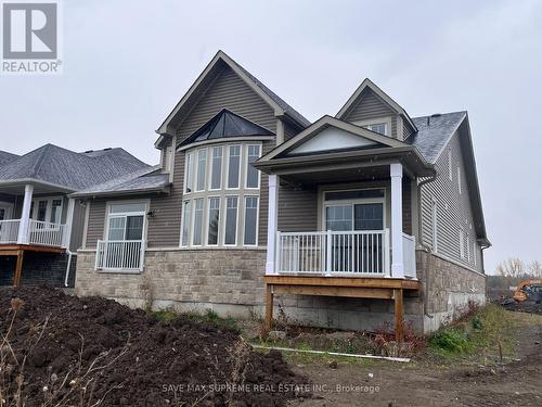 154 Country Club Drive, Loyalist, ON - Outdoor With Facade