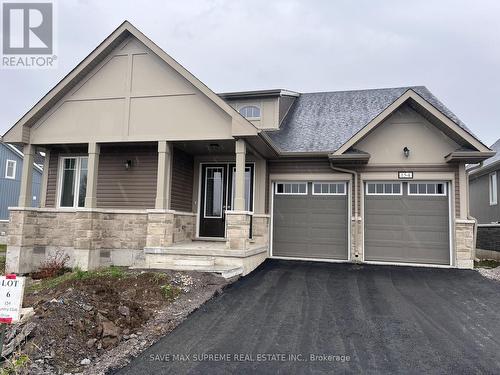 154 Country Club Drive, Loyalist, ON - Outdoor With Facade