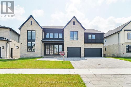 7301 Silver Creek Circle, London, ON - Outdoor With Facade