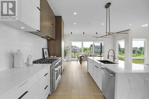 7301 Silver Creek Circle, London, ON - Indoor Photo Showing Kitchen With Double Sink With Upgraded Kitchen