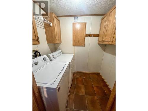 32 - 7126 3A Highway, Nelson, BC - Indoor Photo Showing Laundry Room