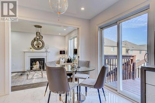 5 Luce Drive, Ajax, ON - Indoor Photo Showing Dining Room With Fireplace