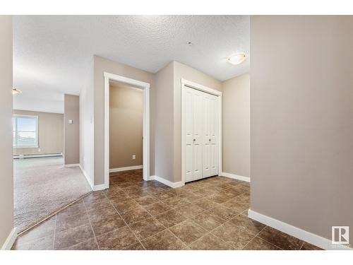 #102 18122 77 St Nw, Edmonton, AB - Indoor Photo Showing Other Room