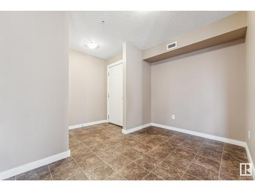 #102 18122 77 St Nw, Edmonton, AB - Indoor Photo Showing Other Room