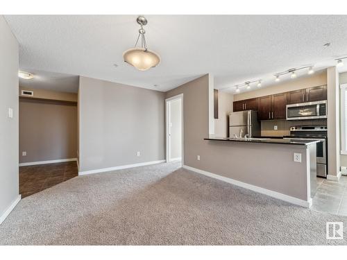 #102 18122 77 St Nw, Edmonton, AB - Indoor Photo Showing Kitchen