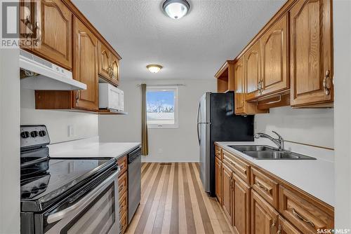 1525 Hnatyshyn Avenue, Saskatoon, SK - Indoor Photo Showing Kitchen With Double Sink