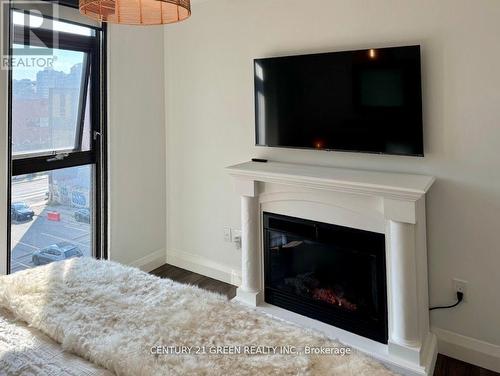 417 - 118 King Street E, Hamilton, ON - Indoor Photo Showing Living Room With Fireplace