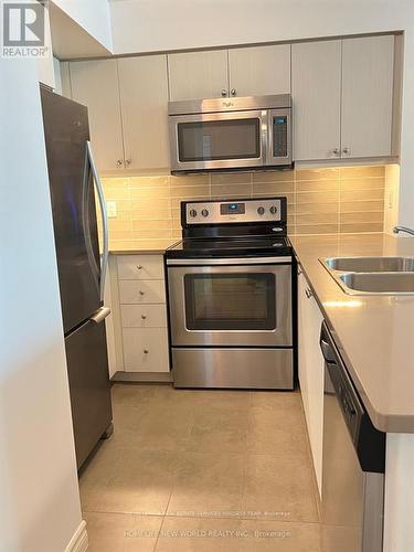 722 - 25 Lower Simcoe Street, Toronto, ON - Indoor Photo Showing Kitchen With Double Sink