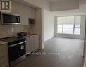 1707 - 202 Burnhamthorpe Road E, Mississauga, ON  - Indoor Photo Showing Kitchen 