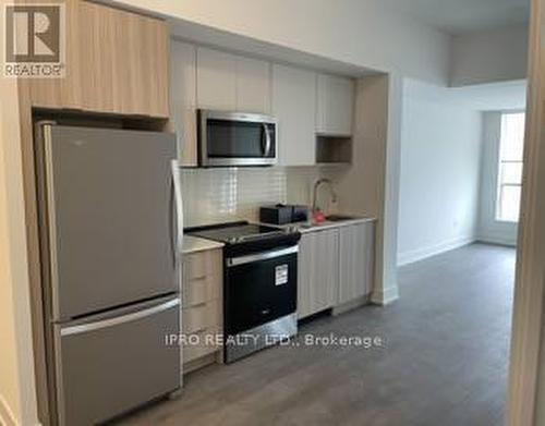 1707 - 202 Burnhamthorpe Road E, Mississauga, ON - Indoor Photo Showing Kitchen