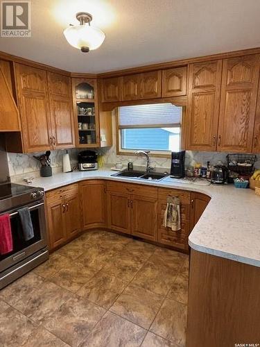 142 Coronation Drive, Canora, SK - Indoor Photo Showing Kitchen With Double Sink