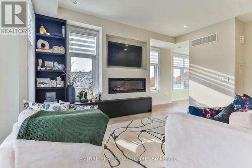 3002 Islington Avenue, Toronto, ON - Indoor Photo Showing Living Room With Fireplace