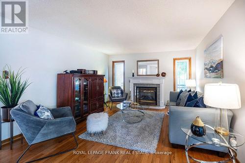 13 Country Lane, Brock (Cannington), ON - Indoor Photo Showing Living Room With Fireplace