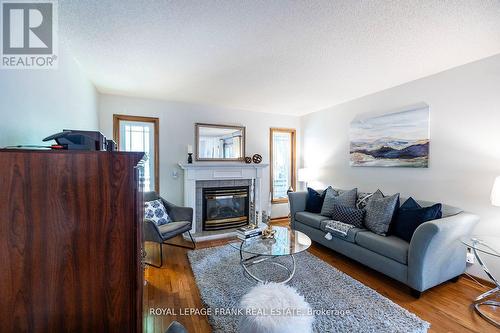 13 Country Lane, Brock (Cannington), ON - Indoor Photo Showing Living Room With Fireplace