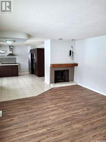 160 Lorne Street W, Swift Current, SK - Indoor With Fireplace