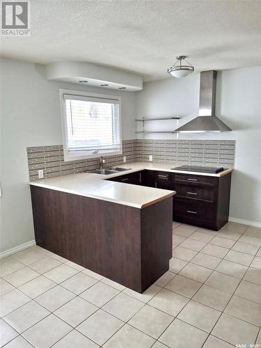 160 Lorne Street W, Swift Current, SK - Indoor Photo Showing Kitchen With Double Sink