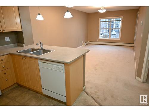 #211 616 Mcallister Lo Sw, Edmonton, AB - Indoor Photo Showing Kitchen With Double Sink