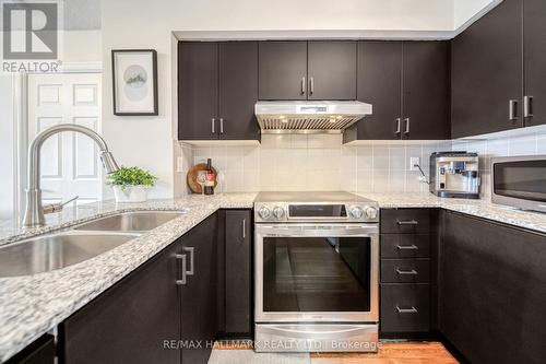 1002 - 225 Wellesley Street E, Toronto, ON - Indoor Photo Showing Kitchen With Double Sink With Upgraded Kitchen