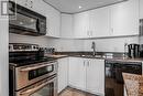 511 - 208 Queens Quay W, Toronto, ON  - Indoor Photo Showing Kitchen With Double Sink 