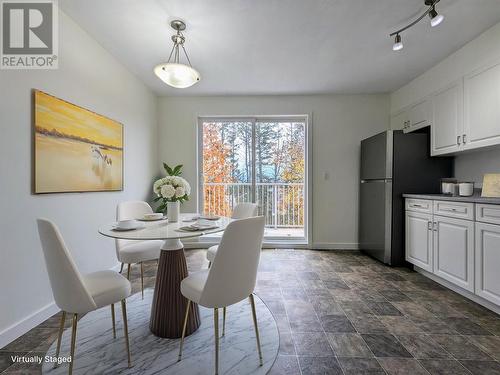 Virtually Staged Kitchen - 200 Black Forest Drive Unit# 707, Invermere, BC - Indoor Photo Showing Dining Room