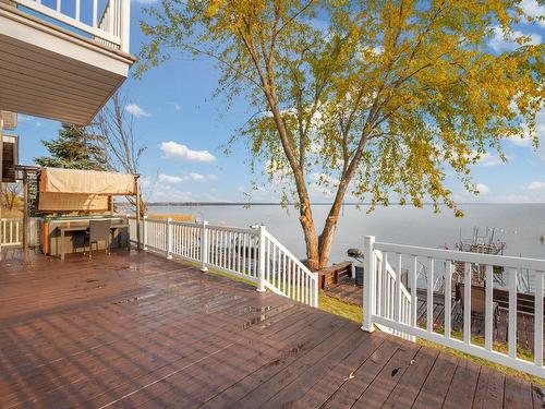 Vue sur l'eau - 1638 Boul. Perrot, Notre-Dame-De-L'Île-Perrot, QC - Outdoor With Body Of Water With Deck Patio Veranda With Exterior