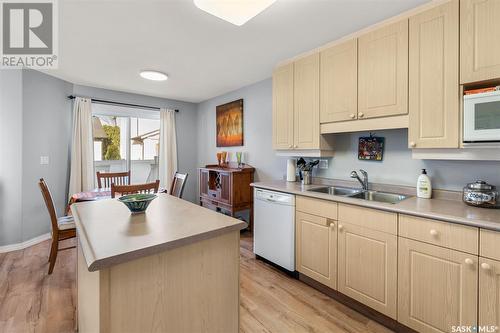 120 515 Mcwillie Avenue, Saskatoon, SK - Indoor Photo Showing Kitchen With Double Sink