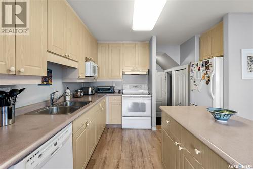 120 515 Mcwillie Avenue, Saskatoon, SK - Indoor Photo Showing Kitchen With Double Sink