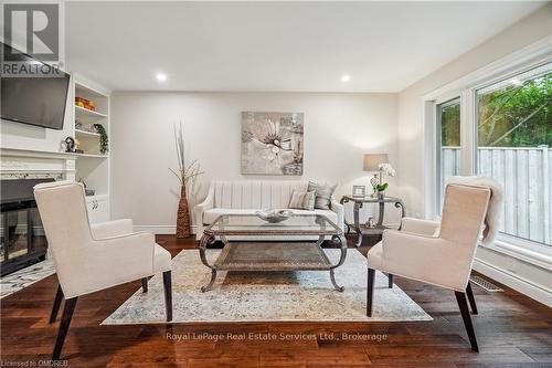 3 - 1513 Upper Middle Road, Burlington (Tyandaga), ON - Indoor Photo Showing Living Room With Fireplace