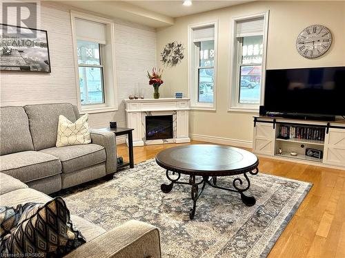 441 Queen Street N, Paisley, ON - Indoor Photo Showing Living Room With Fireplace