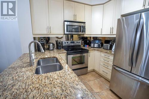 303 - 9235 Jane Street, Vaughan, ON - Indoor Photo Showing Kitchen With Stainless Steel Kitchen With Double Sink