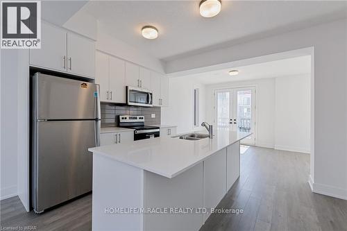 28 - 99 Roger Street, Waterloo, ON - Indoor Photo Showing Kitchen With Double Sink With Upgraded Kitchen