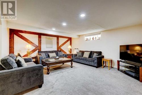 940 Rundlecairn Way Ne, Calgary, AB - Indoor Photo Showing Living Room