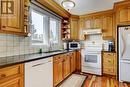 940 Rundlecairn Way Ne, Calgary, AB  - Indoor Photo Showing Kitchen 