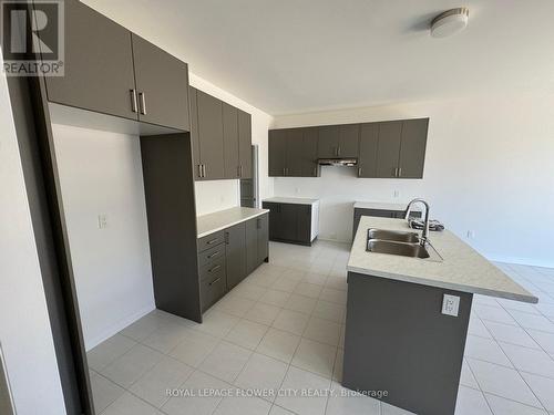 295 Rea Drive, Centre Wellington, ON - Indoor Photo Showing Kitchen With Double Sink