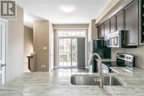 79 - 541 Winston Road, Grimsby, ON - Indoor Photo Showing Kitchen With Double Sink With Upgraded Kitchen