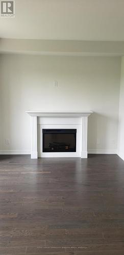 48 Reistwood Drive, Kitchener, ON - Indoor Photo Showing Living Room With Fireplace