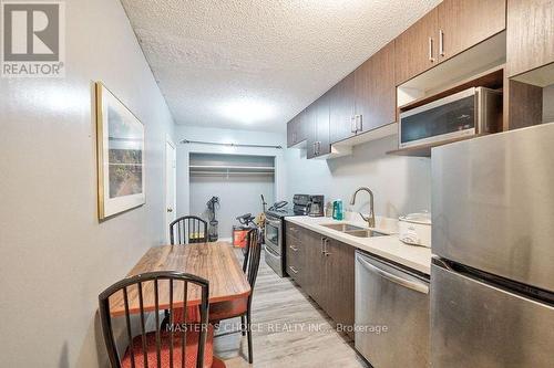 231 - 106 Carden Street, Guelph, ON - Indoor Photo Showing Kitchen With Double Sink