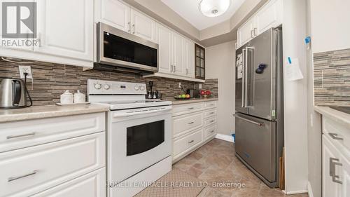 210 - 22 Hanover Road, Brampton, ON - Indoor Photo Showing Kitchen