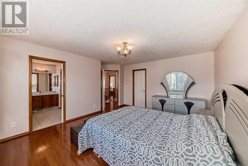 180 Panatella Close Nw, Calgary, AB - Indoor Photo Showing Bedroom