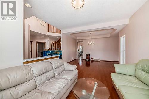 180 Panatella Close Nw, Calgary, AB - Indoor Photo Showing Living Room