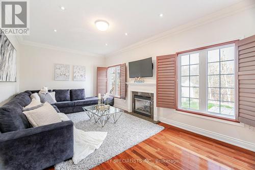 7 Sorbonne Drive, Brampton, ON - Indoor Photo Showing Living Room With Fireplace