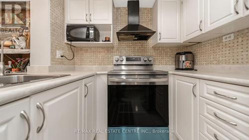 2067 - 3041 Finch Avenue W, Toronto, ON - Indoor Photo Showing Kitchen