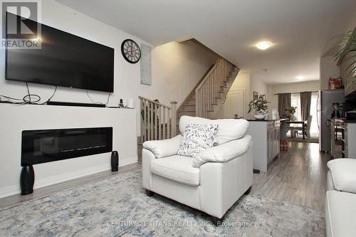 1703 Pleasure Valley Path, Oshawa, ON - Indoor Photo Showing Living Room With Fireplace