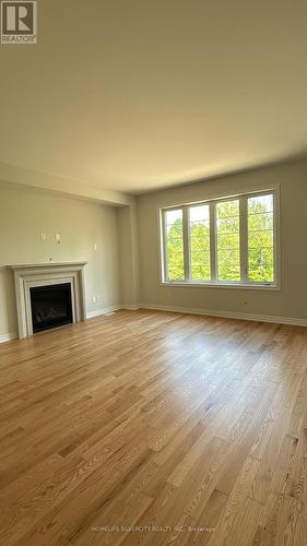 73 Big Canoe Drive, Georgina, ON - Indoor Photo Showing Living Room With Fireplace