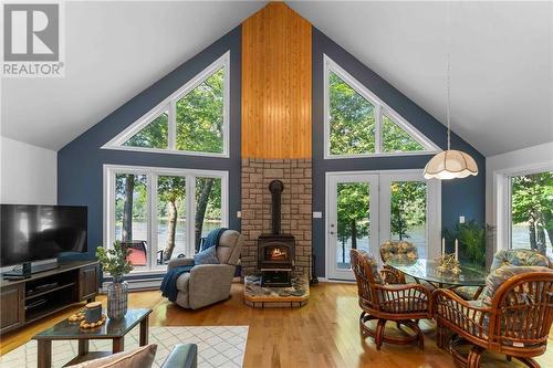 125 Clem Trail, Westmeath, ON - Indoor Photo Showing Living Room With Fireplace