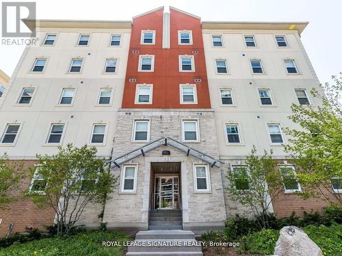 101 - 253 Lester Street, Waterloo, ON - Outdoor With Facade