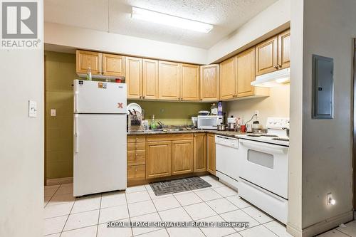 101 - 253 Lester Street, Waterloo, ON - Indoor Photo Showing Kitchen With Double Sink