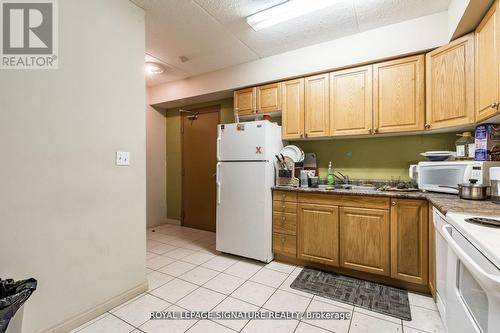 101 - 253 Lester Street, Waterloo, ON - Indoor Photo Showing Kitchen With Double Sink